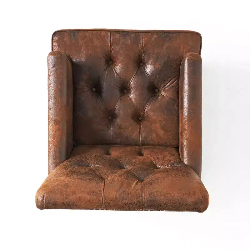 Fauteuil Club avec dossier capitonné et clous décoratifs