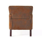 Fauteuil Club avec dossier capitonné et clous décoratifs