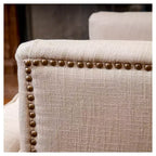 Fauteuil Club avec dossier capitonné et clous décoratifs