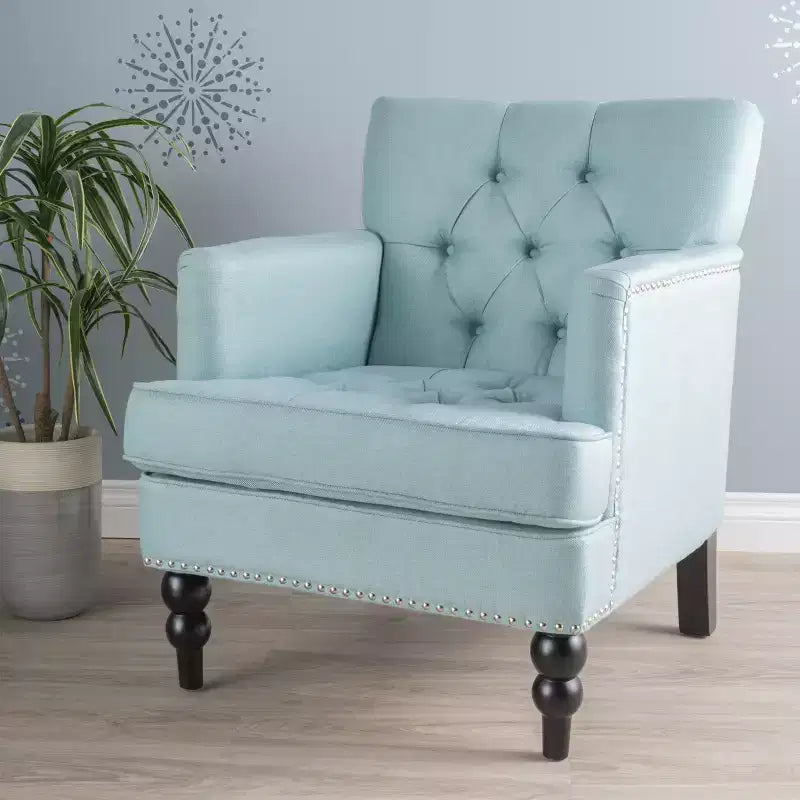 Fauteuil Club avec dossier capitonné et clous décoratifs